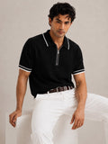 Amalfi Zip Black Polo – jet black fine-knit polo with white contrast zip and cuff detailing