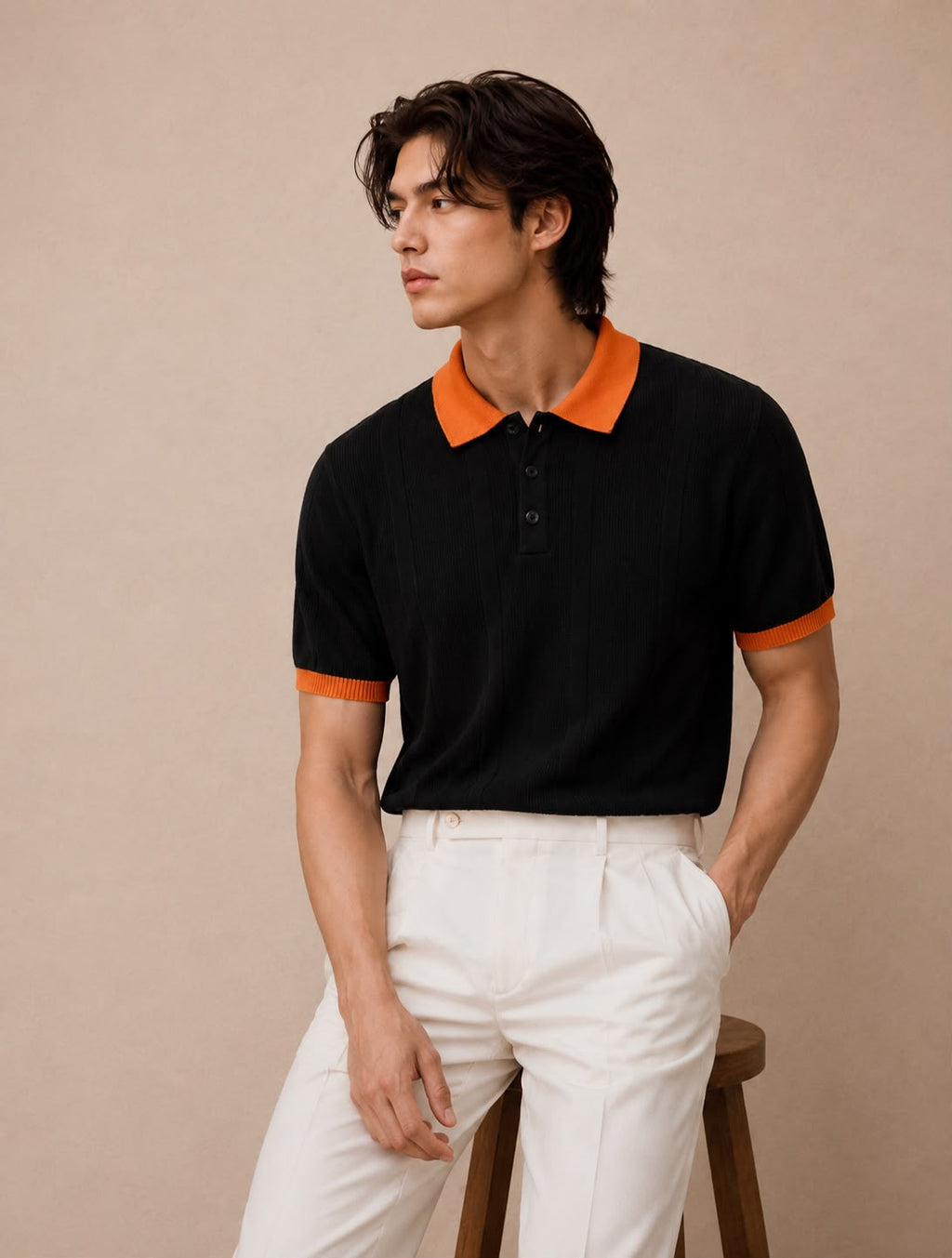 Black Orange Contrast Knit Polo by BEZOKE